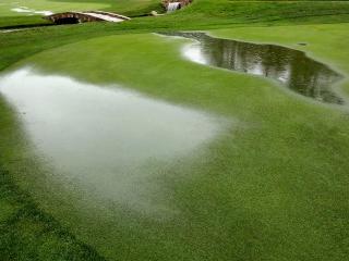 The soaking wet 18th fairway at Baltusrol yesterday